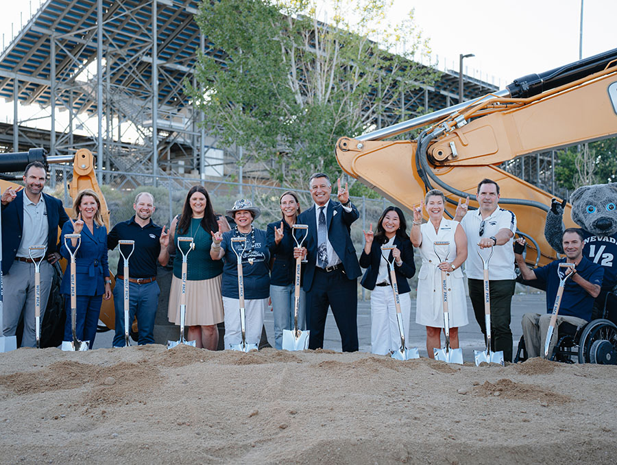 Brian Sandoval, Stephanie Rempe posing with Regents and Tolles Development holding shovels at the groundbreaking site.