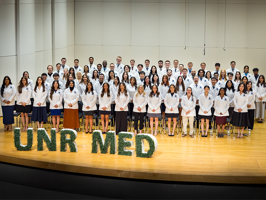 The Doctor of Medicine Class of 2029 on stage at their White Coat Ceremony.