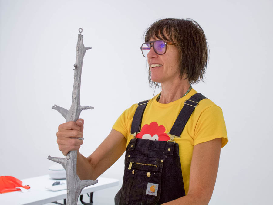 Sasha Petrenko getting ready to install her art.