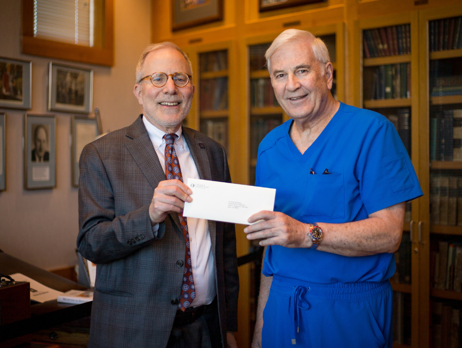 Dean Hauptman and C. Craig Karrasch, M.D., trustee of The Thelma B. and Thomas P. Hart Foundation