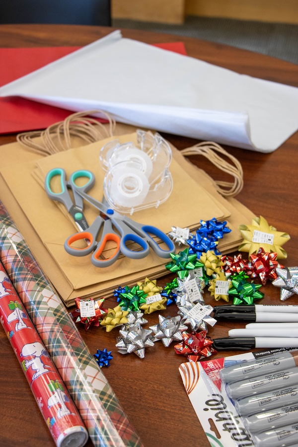 Wrapping supplies on a table.