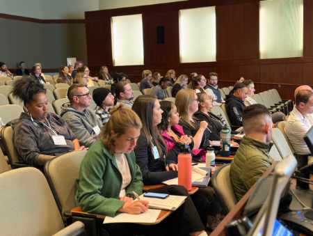Attendees taking notes at the StreetReach Summit.