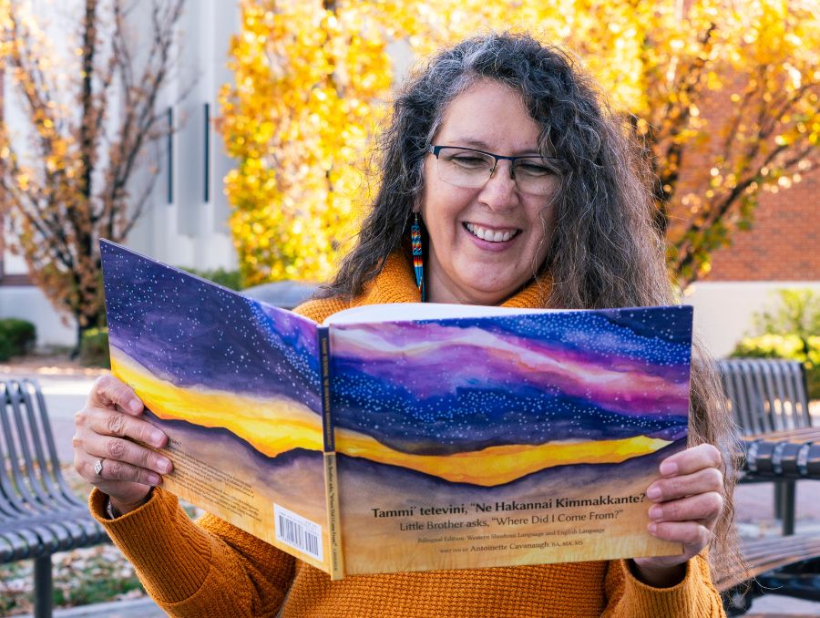 Antoinette Cavanaugh reading the book she wrote.