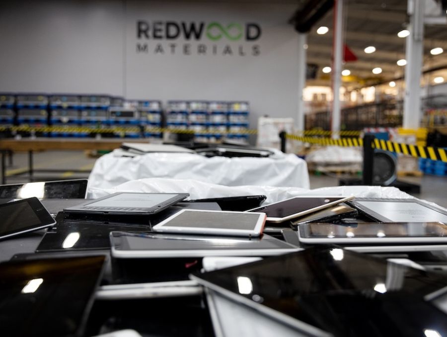 A pile of tablets and devices ready for recycling at Redwood Materials.