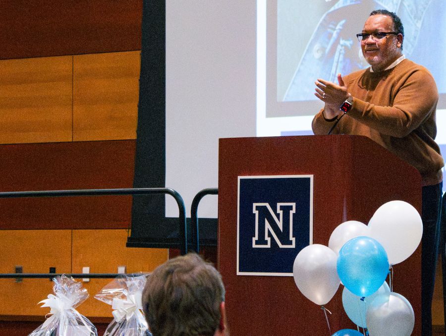 Dean Donald Easton-Brooks at a podium.