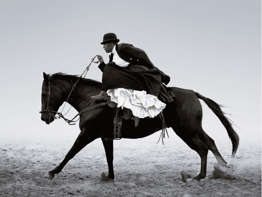 Artwork depicting a person on a horse.