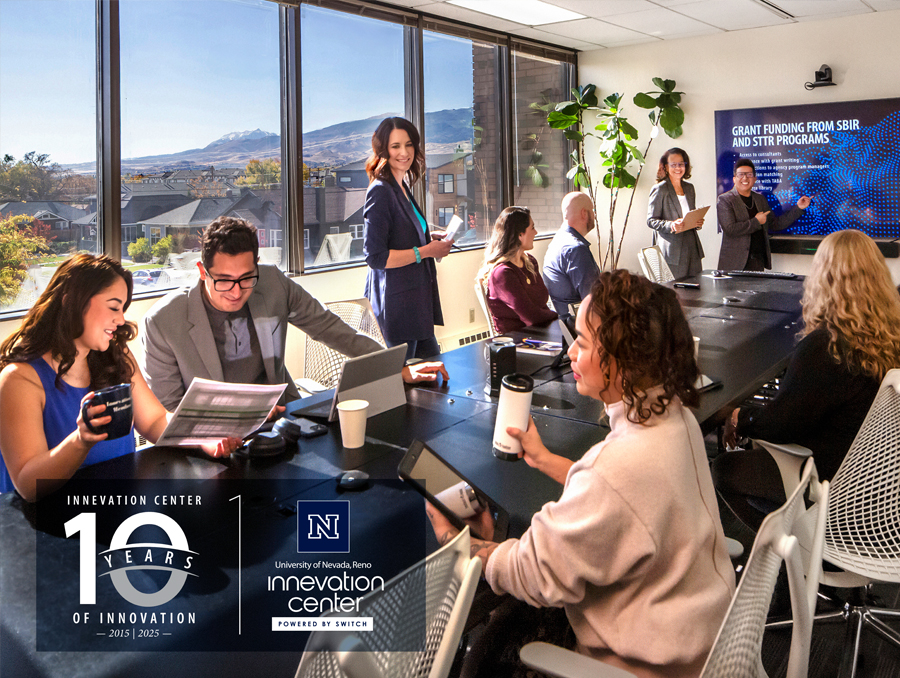 Innevation Center's Summit Conference Room with people around the table, looking at phones and computers, smiling. The logo for the 10 year anniversary is included.