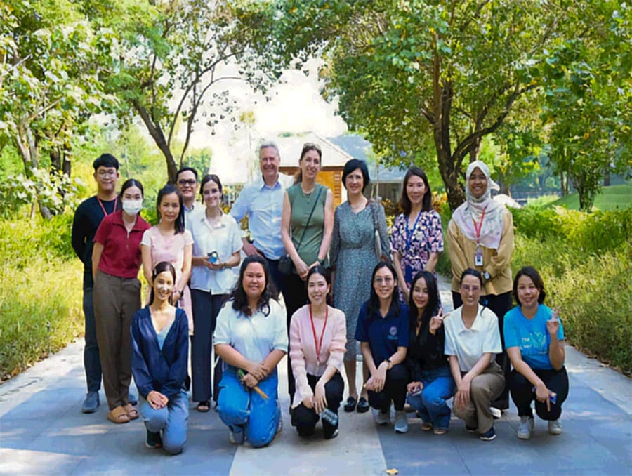 Paul Brett and Mary Burtnick with collaborators in Bangkok.