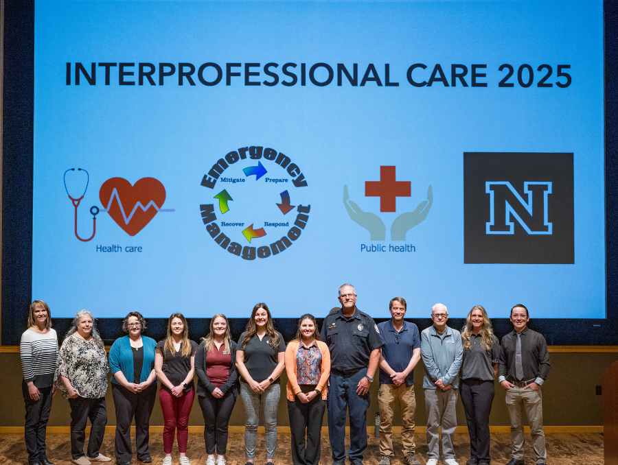 Interprofessional Care TXX Facilitators standing in group.
