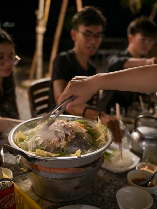 A steaming hot pot at a restaurant in Cambodia.