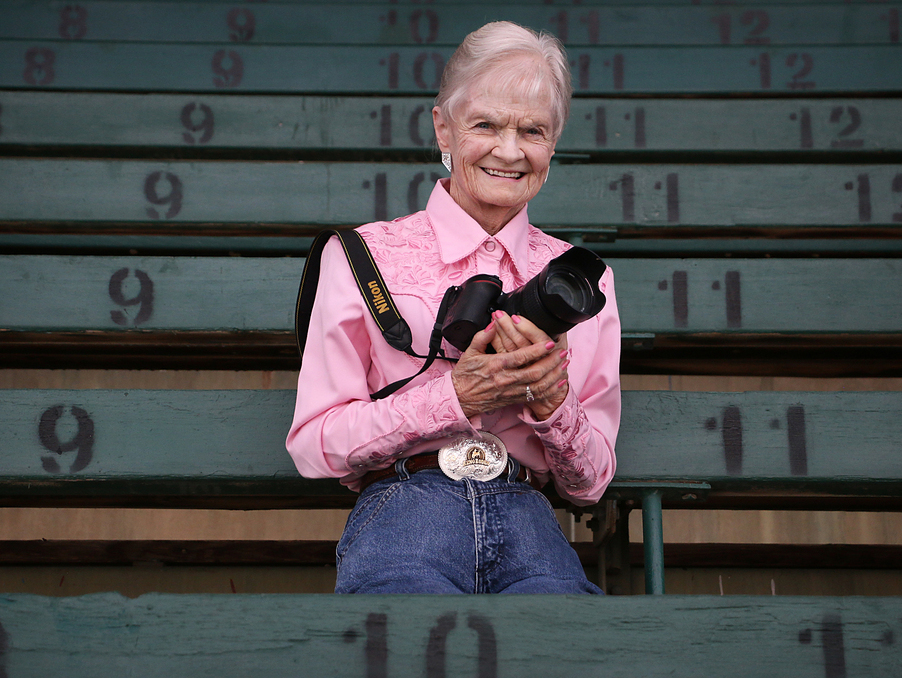 Marilyn Newton poses with her camera.