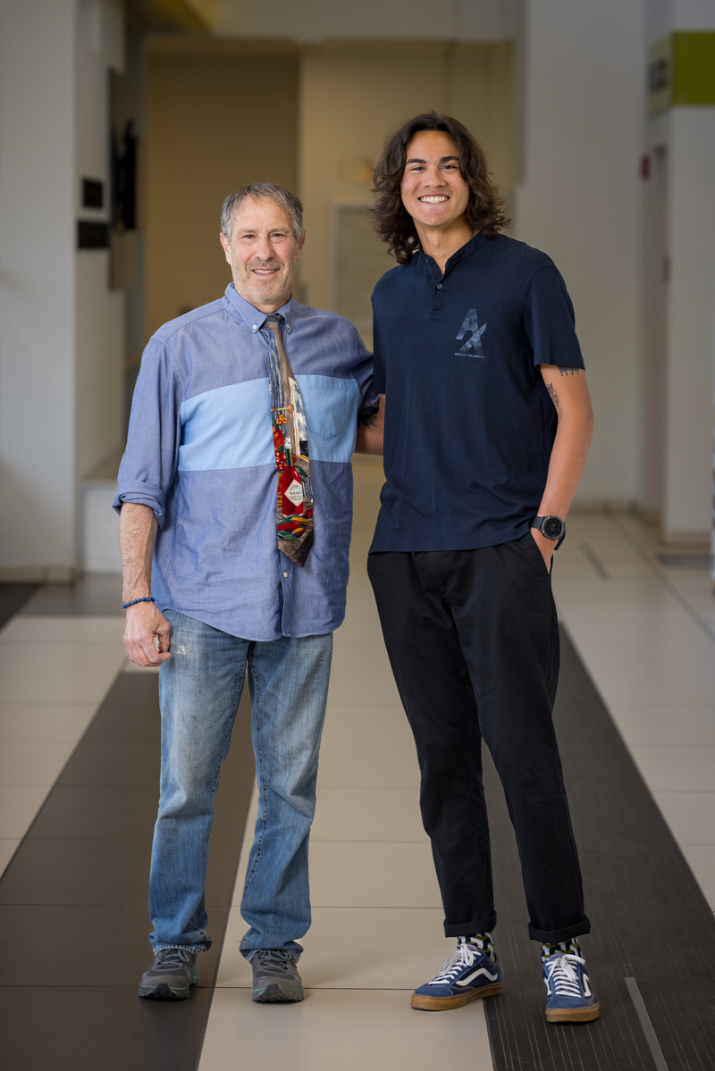 Mentor Dean Hinitz with Ashton Gabriel Sharp posing in a hallway.