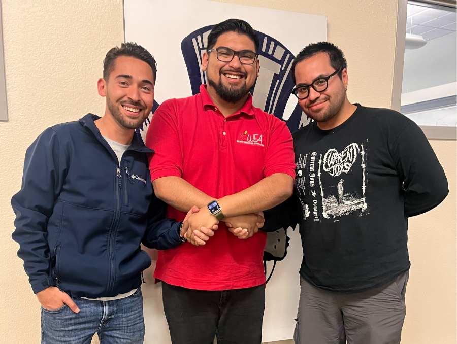 Samuel Rosales Rivas (center) shaking hands with Francisco Lopez Cabrera (left) and Marbel Alberto (right).