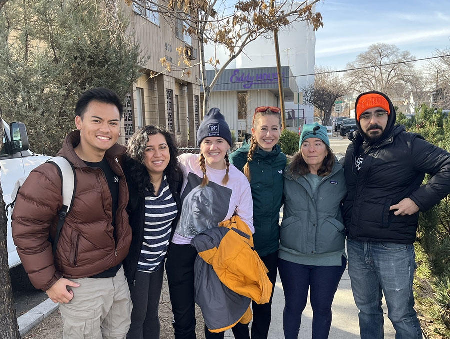 Street Medicine Clinic volunteers standing outside of Eddy House building.