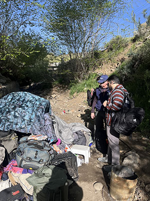 Volunteers outside homeless population camp in Reno.