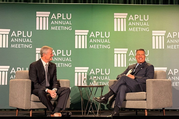 President Brian Sandoval (right) moderating the session with NCAA President Charlie Baker at the APLU Annual Meeting. 
