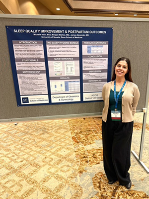 Michelle Irish standing next to her research poster.