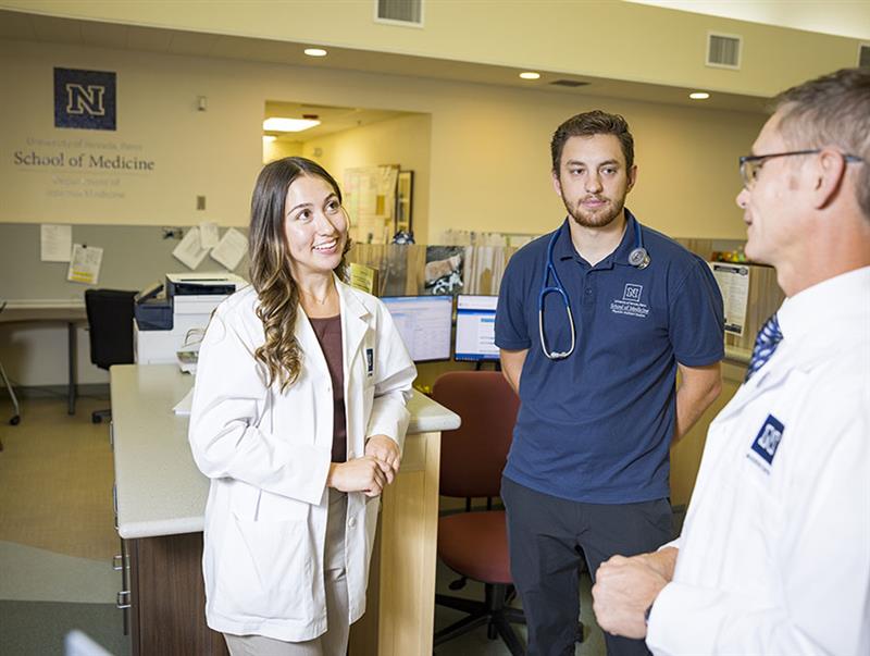 Director of Physician Assistant Studies, Brian S. Lauf, DMSc, PA-C, DFAAPA mentoring physician assistant students.