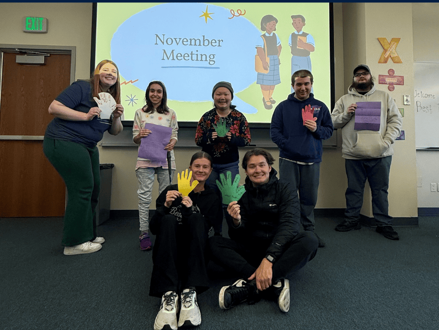 Best Buddies members smiling during their November 2025 meeting.