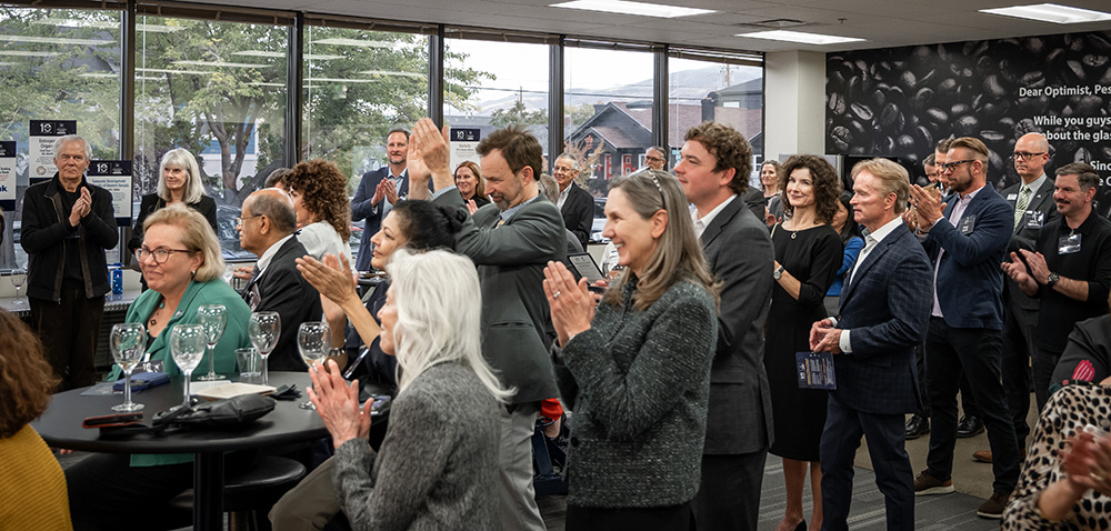 Group of people applauding at the UNR Innevation Center's 10-year anniversary celebration.