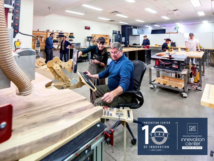 Several people working on various projects at the UNR Innevation Center workshop, celebrating 10 years of innovation.