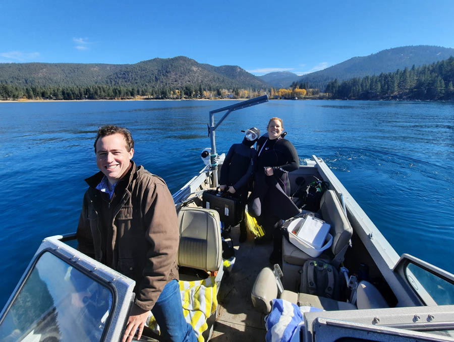 Dr. Kelly Loria and her colleagues suit up to jump into Lake Tahoe for some sampling.