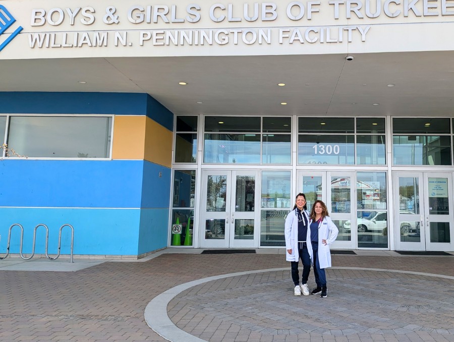 Vania Carter-Strauss and Marlyn Arce-Gomez in front of the Boys and Girls Club of Truckee Meadows