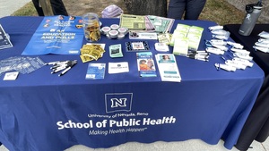 The Condom Collective booth with sexual health information and resources.