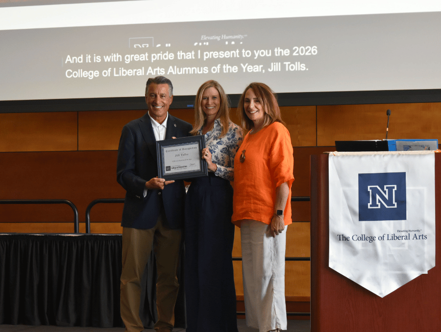 Jill Tolles on stage with President Sandoval and Dean Isabelli.
