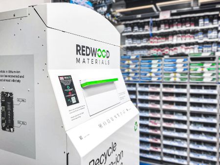 A Redwood Materials recycling bin inside a store.