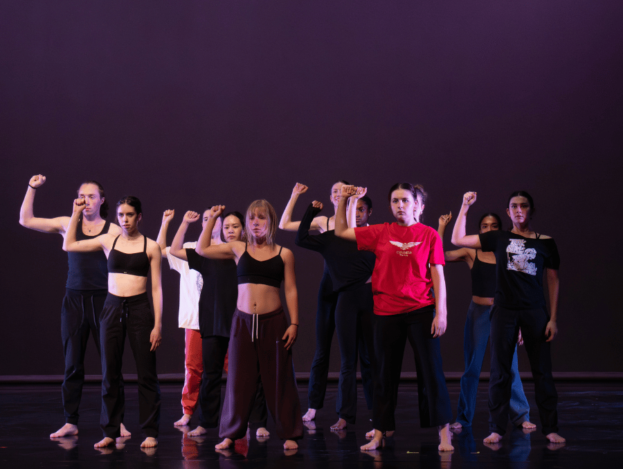 Students dancing on stage. 