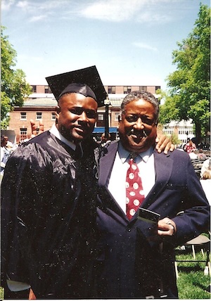 Jason Frierson and his father at graduation.