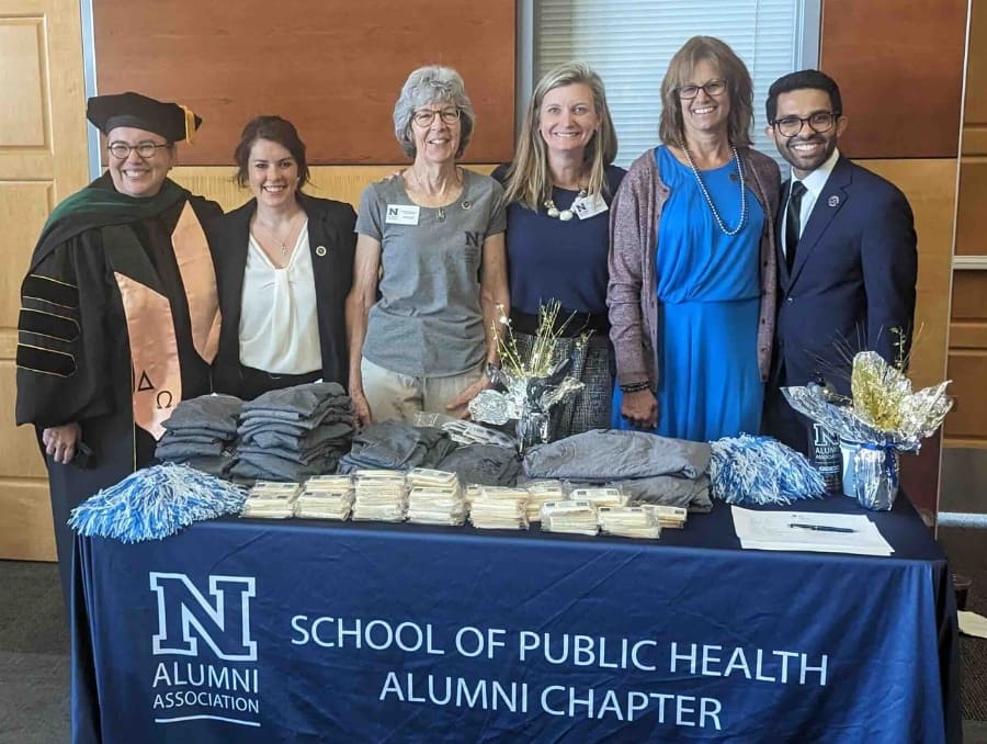 Marena Works surrounded by members of the School of Public Health Alumni Chapter board.