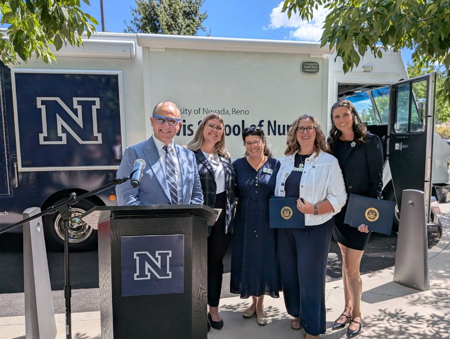 U.S. Sen. Jacky Rosen’s representative and U.S. Sen. Catherine Cortez Masto’s representative presenting a certificate to Dean Yingling, Jane Fox and Molly Kokenge
