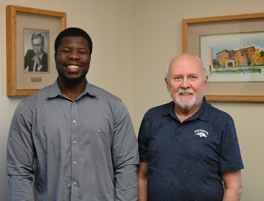 Lawal and Hitchcock standing together. 