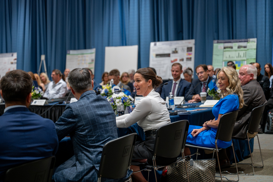 People at table during a discussion. 