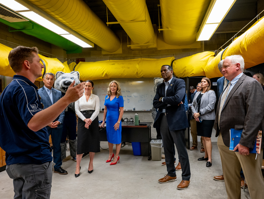 US representatives are given a tour of the Mackay School. 