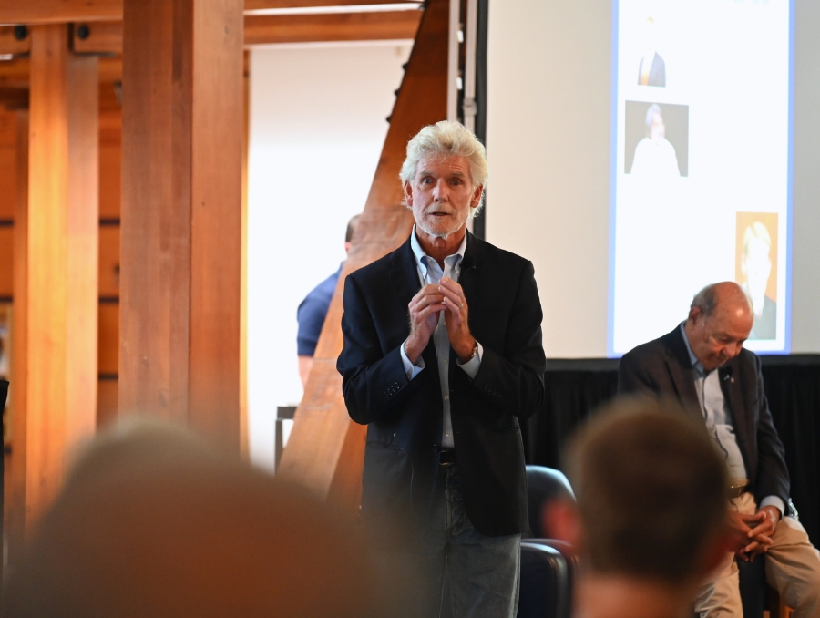 Rick Trachok speaking to a room full of people in Lake Tahoe.