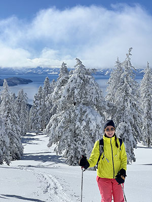 Nicole Clifton skiing in the mountains.