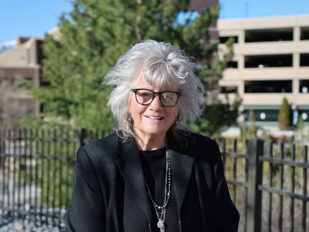 Nancy Roget smiling.