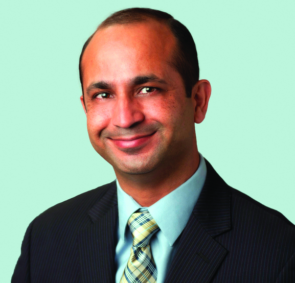 Malhotra's headshot. 