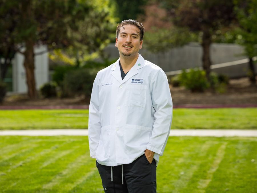 Physician assistant studies student, Brayan Alberto Chagolla Felipe, wearing a stethoscope