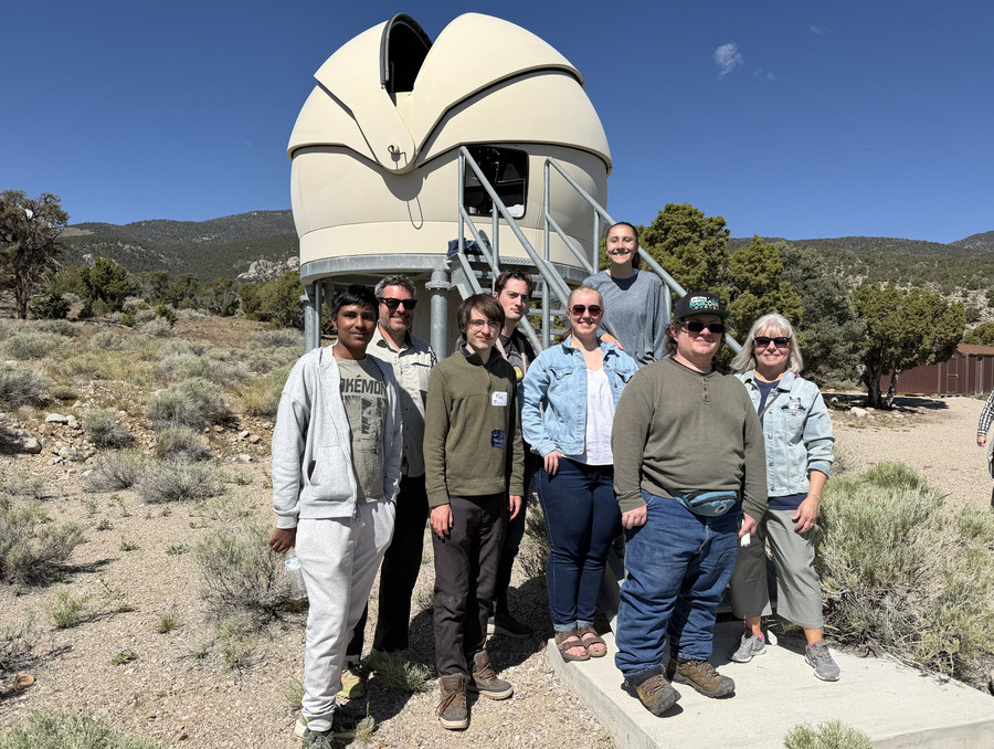 Students and faculty gather outside the Observatory for a photo.