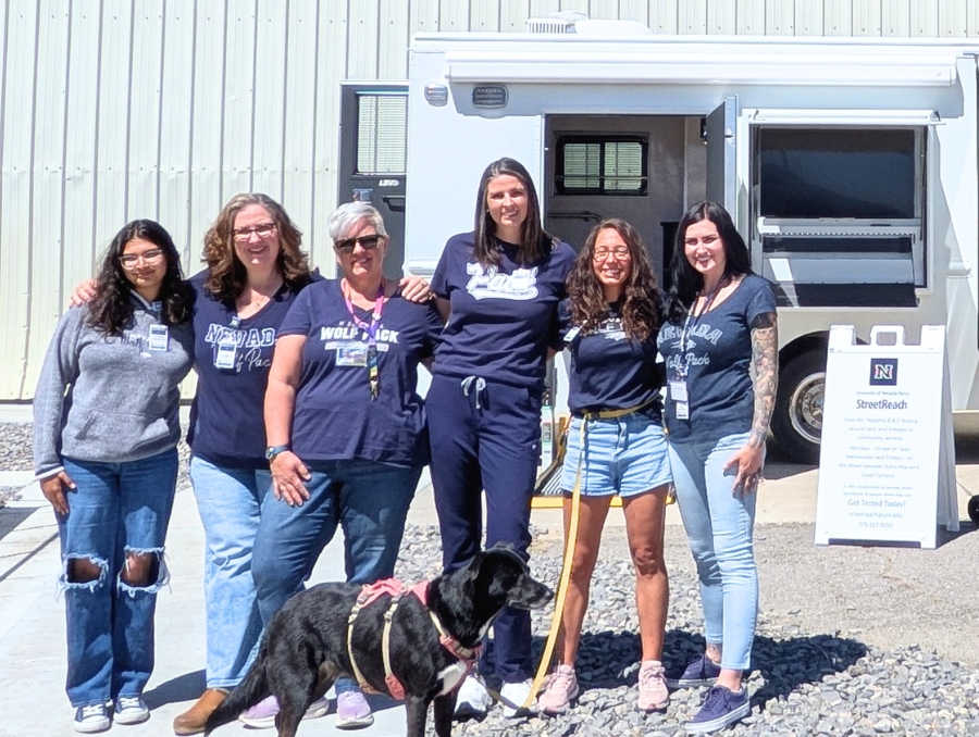 StreetReach team in front of the mobile health unit.