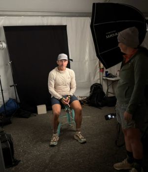 Nathan Hannemann resting after the race and preparing to pose for a portrait