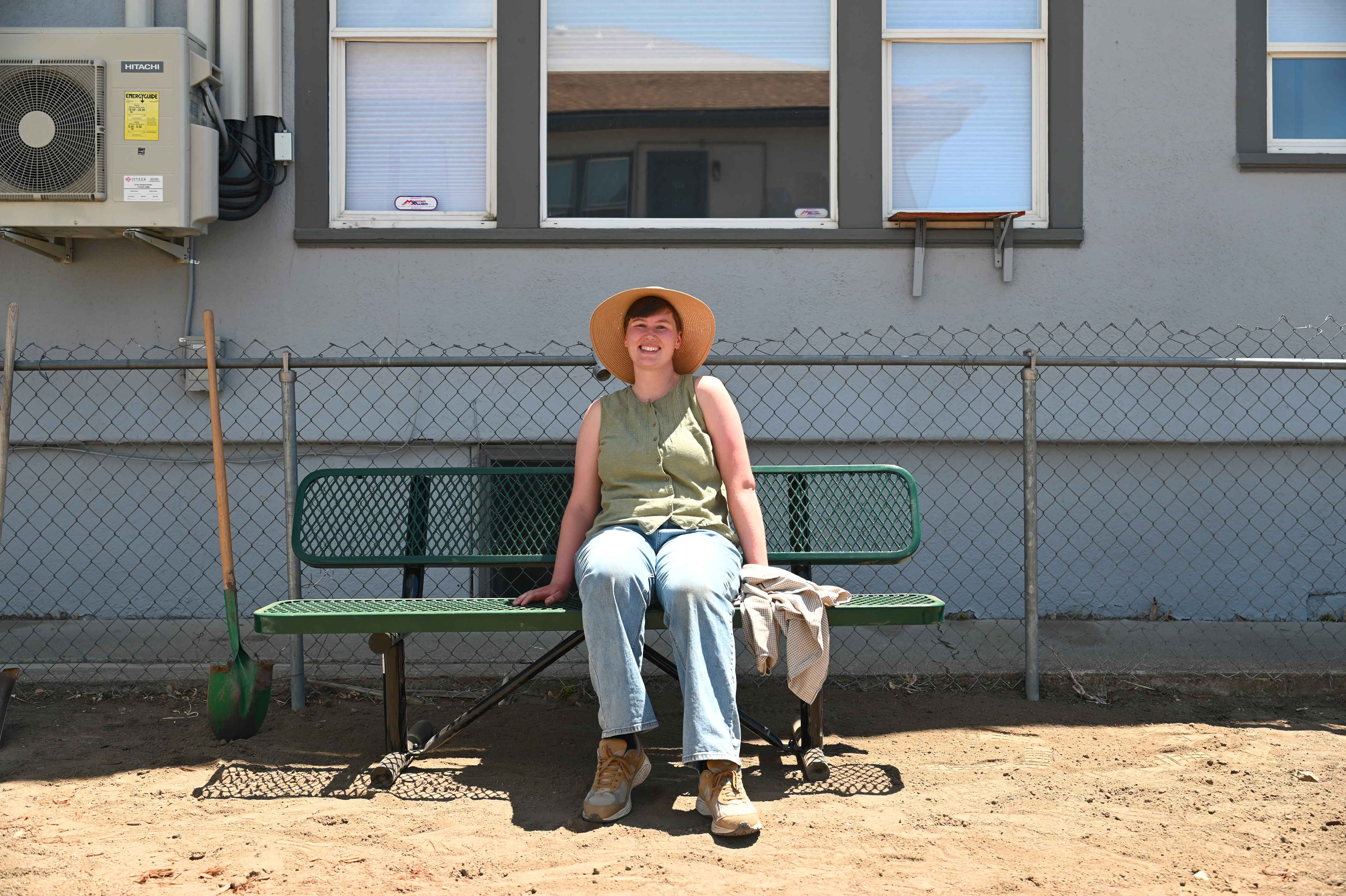 Kahlo Smith poses on dirt lot.