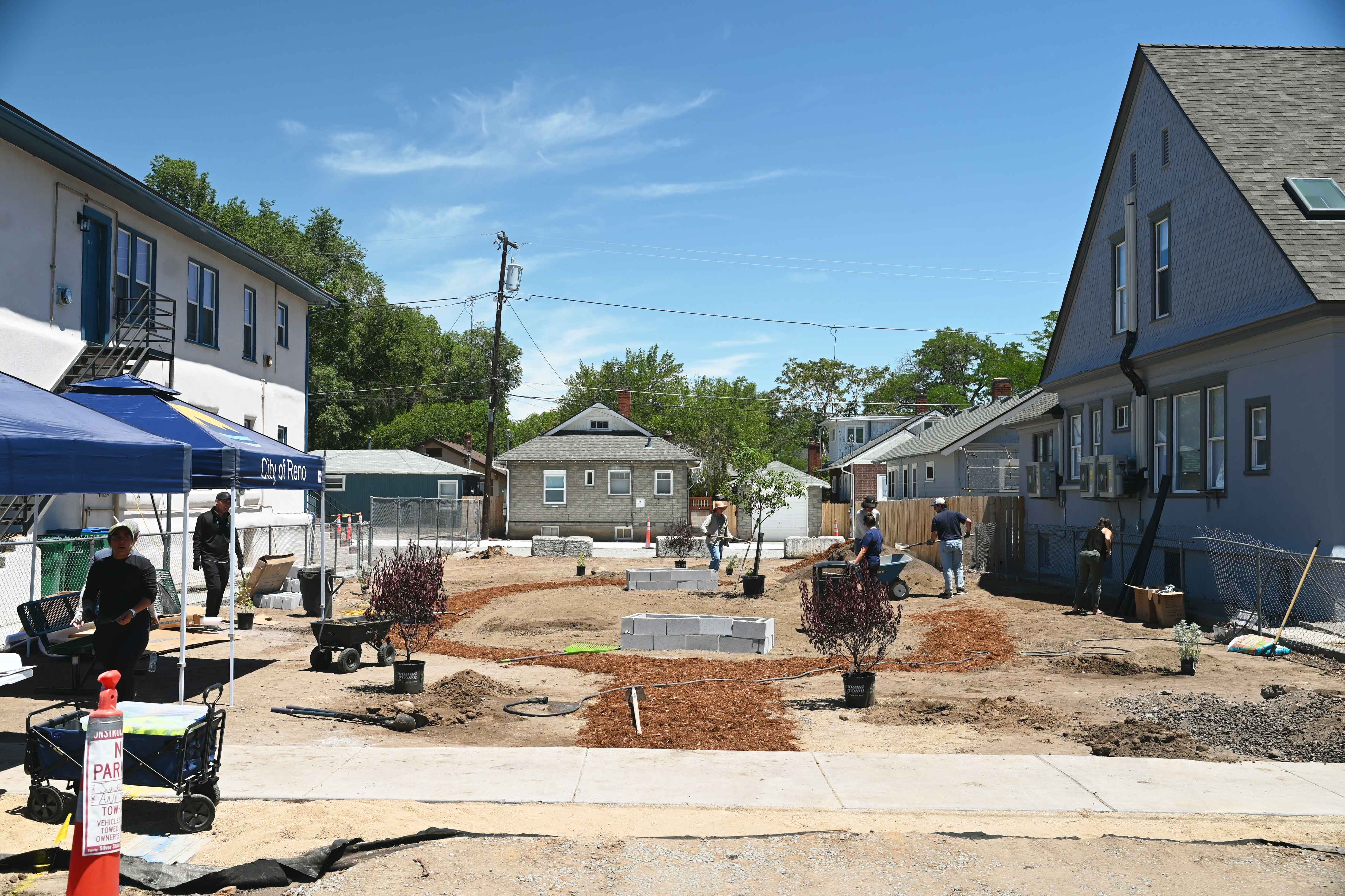 People working on restoring the area into a park.