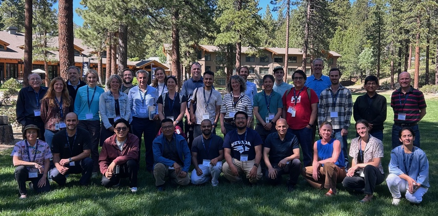A group of people gather on Lake Tahoe campus. 