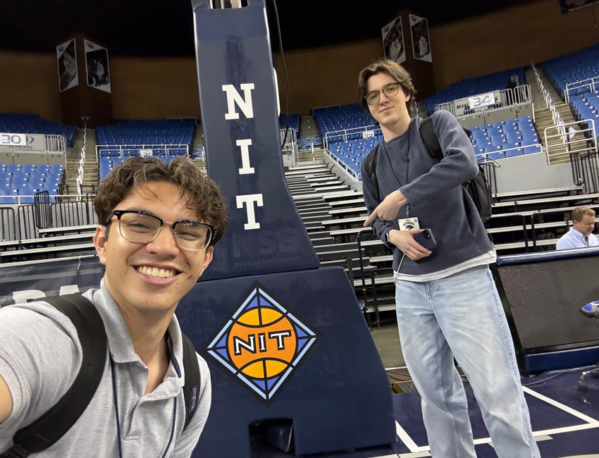 James Perez and Max Alexander in Lawlor Events Center for a basketball game.