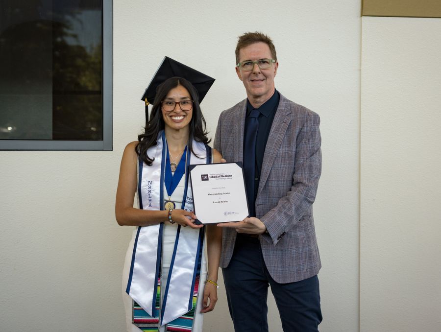 Lexali Bravo with Marki Guiberson, Ph.D., CCC-SLP, chair of the Department of Speech Pathology and Audiology, at a reward reception where Bravo was a recipient of the Outstanding Senior Award.